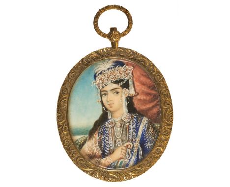 * Indian School. Portrait of a lady, mid 19th century, watercolour and gouache, heightened with bodycolour, on ivory, oval ha