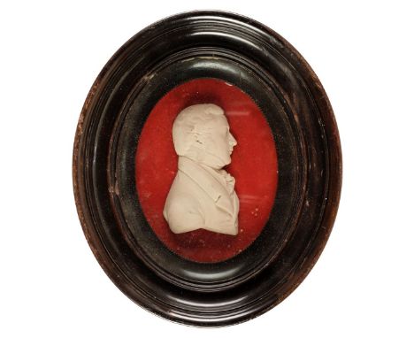 * English School. Portrait of a young gentleman, circa 1820, plaster portrait bust of a young gentleman profile facing right,