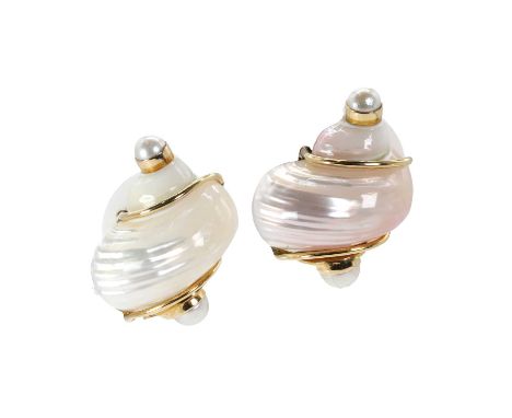A pair of Turbo Shell clip earrings, by Seaman Schepps, with two white shells culminating in a cultured pearl at each end. Mo