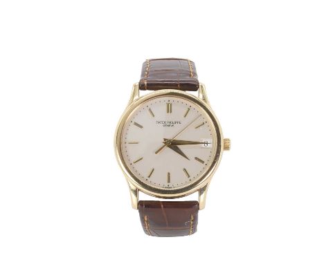 A gentlemen’s 18ct gold Patek Philippe Calatrava automatic strap watch,  3998J, with a 34mm case, c.1997. A silvered dial wit