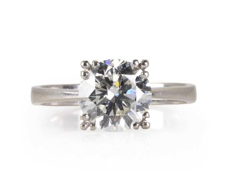 A white gold single stone diamond ring,  with a round brilliant diamond, estimated as 2.10ct, in a triple claw prong setting,