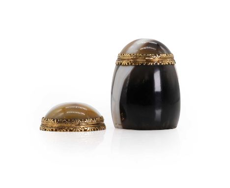 A gold mounted barrel shaped banded agate snuffbox,   with double hinged cover, one lid detached from the barrel, 28.65gProve
