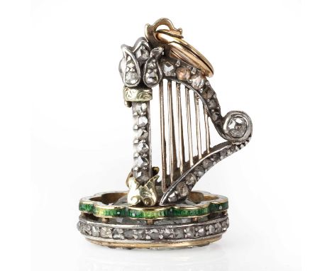 A diamond and enamel harp fob seal, the harp with a silver body accented with graduating rose cut diamonds and yellow gold st