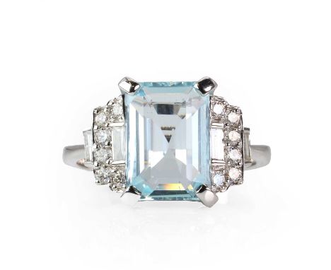 A white gold aquamarine and diamond ring,  a rectangular step cut aquamarine, with a stated weight of 2.92ct, claw set to the