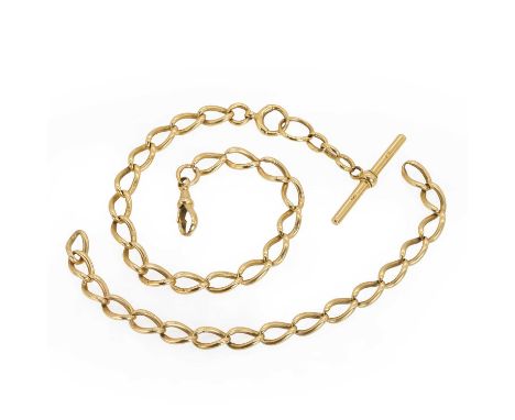 An 18ct gold Albert chain, with oval curb links individually marked 18ct, the chain divided into two sections joined by a swi