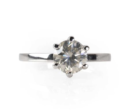 A white gold single stone diamond ring,  with a round brilliant cut diamond, estimated as approximately 1.20ct, six-claw set 