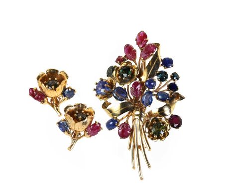 A varicoloured gemstone spray brooch and earrings set, c.1940-1950, the brooch modelled as a large floral spray, claw set wit
