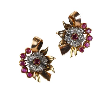 A pair of bicoloured gold ruby and diamond clip earrings, c.1950, of spray and ribbon design, the rose gold mounts with polis