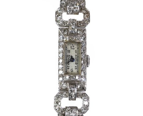 A ladies' Art Deco diamond cocktail watch,  the rectangular case with a silvered dial, black Arabic numerals and blue spade h