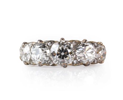 A late Victorian five stone diamond ring,  with five graduated old mine cut diamonds, the central one estimated as approximat