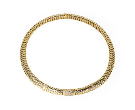 A two-colour diamond Cartier Tubogas collar necklace, modelled as a 'gas pipe' link collar, with central trapeze shaped panel