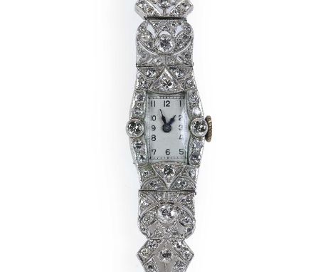 An Art Deco ladies' diamond set cocktail watch, c.1925,  a tonneau-shaped case, 26 x 17mm, millegrain set throughout with gra