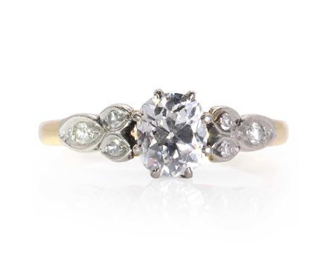 A single stone diamond ring, c.1950,  an old oval cut diamond of approximately 0.70ct set in an eight-claw collet, to raised 