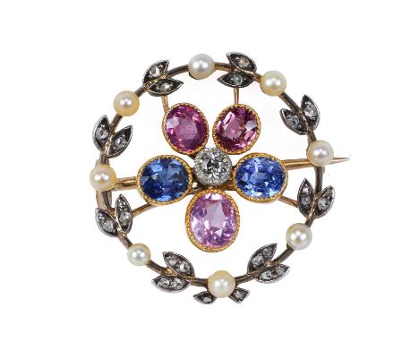 A blue and pink sapphire, diamond and split pearl wreath brooch, the open circle frame composed of alternating rose-cut diamo