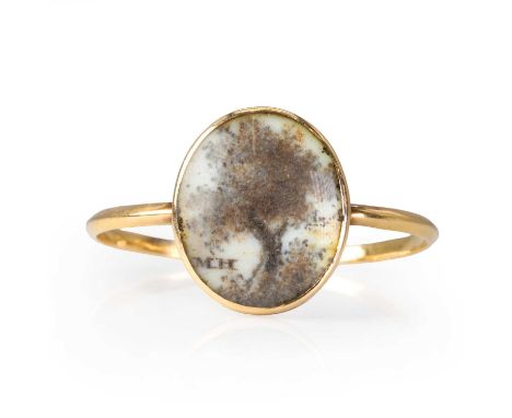 A Georgian mourning ring, 18th century, the small miniature depicting a tree and the initials MH, in hair, with a closed back