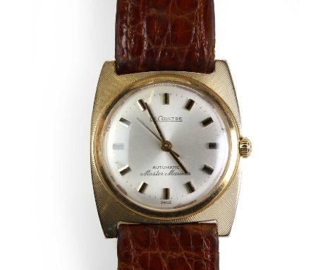 A gold Le Coultre Master Mariner automatic strap watch,  with an engine turned sunburst gold case, 26mm x 32mm, silvered dial