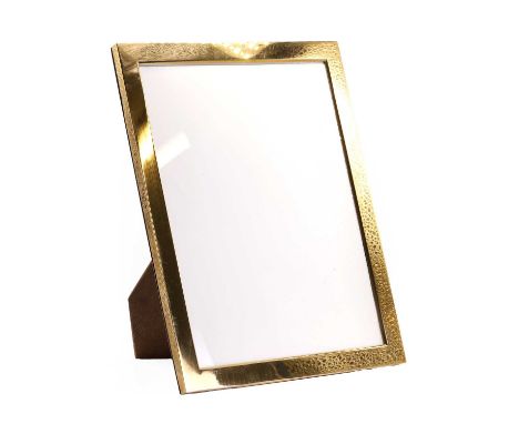 An Italian gold photo frame, the glazed rectangular polished frame with a wooden backing and hinged wooden stand, to fit an 1