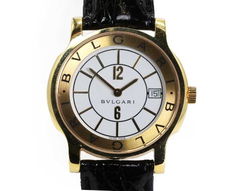 An 18ct gold Bulgari Solotempo quartz strap watch,  a 35mm diameter case, with a white enamel dial, gilt stick hour markers, 