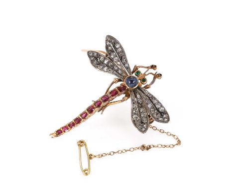 A diamond and gemstone set dragonfly brooch, c.1890,  the body consisting in a line of rub set oval cut rubies, into a sapphi