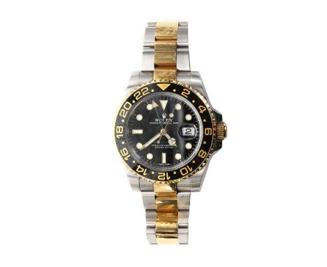 A gentlemen's stainless steel and 18ct gold Rolex GMT Master II automatic bracelet watch,  ref. 116713. A 40mm case, 18ct gol