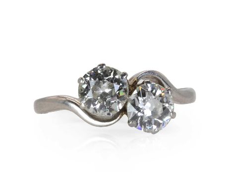 A platinum and diamond Toi Et Moi ring, c.1930,  set with two old European cut diamonds, total diamond weight approximately 1