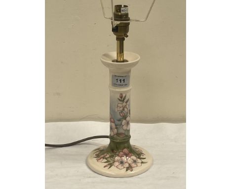 A Moorcroft 'Spring Blossom' pattern tube-lined decorated candlestick lamp. 8¼' high excluding fitting