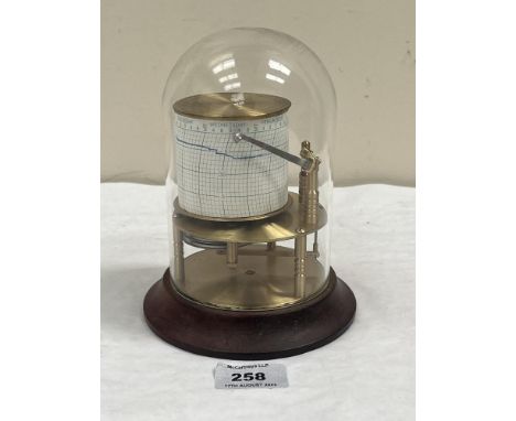 A brass barograph under a glass dome. 6½' high