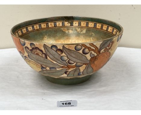 A Charlotte Rhead for Bursley Ware bowl, with tube-lined decoration of fruit. 9½' diam. Repaired chip to rim