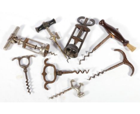 Wells of 431 West Strand iron corkscrew, R. Jones corkscrew, five others and a spigot. CONDITION REPORT: The Wells corkscrew 
