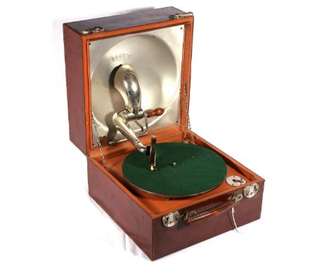 Decca portable gramophone in fitted leather case, RD631877, patent 3033. CONDITION REPORT: The turntable rotates when wound u