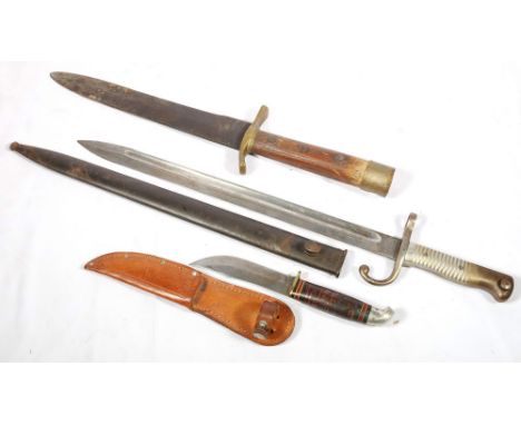 German sword bayonet having a fullered blade with ricasso marked for 'Weyersberg Kirkschbaum & Co,. Solingen', metal grip and