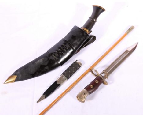 Queen's Own Cameron Highlanders swagger stick; Wilkinson Sword sgian-dubh; 1947 pattern knife bayonet; and a kukri.  (4)