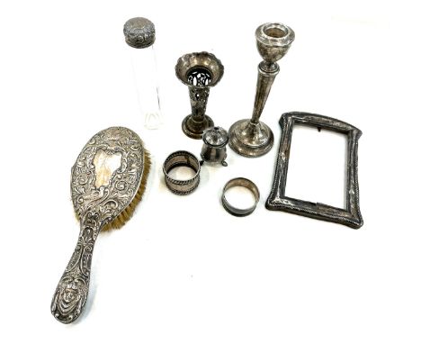 Selection of vintage and later silver items includes brush, candle sticks etc 