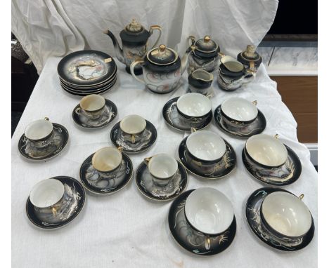 Vintage hand painted tea and coffee service with Geisha girl 