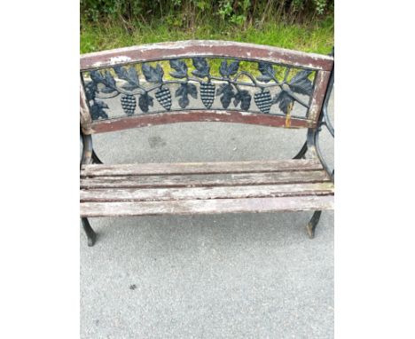 Cast iron bench with cast iron back, approximate measurements: 