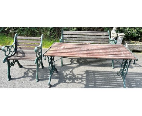 Cast iron table, chair and bench, approximate measures of table: Width 56 inches, Height 26 inches, Width 26 inches