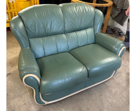 2 Seater green leather sofa, approximate measurements: Height 35 inches, Depth 23 inches, Width 55 inches