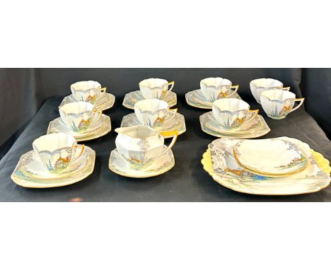 Vintage cottage design Shelly part tea set comprising of 7 complete trios, milk jug, damaged cake plate, 2 additional cups an