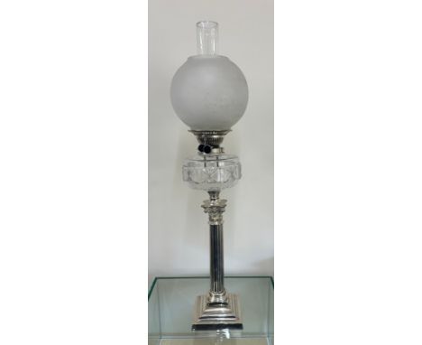 Silver plated column base oil lamp height approximately 30 inches, complete with funnel and shade