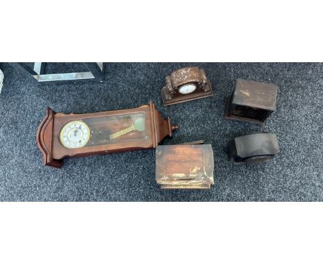 Large selection of assorted clocks includes wall clocks, mantle clock etc, all untested 
