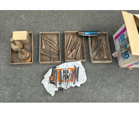 Selection of vintage stone mason ware tools 