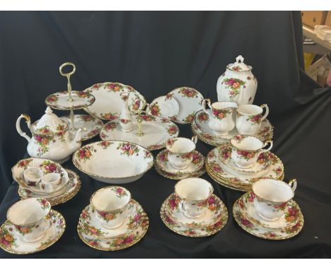 Royal Albert Old Country Rose Tea Service to include 6 cups,6 saucers,cake stand etc . Approximately 40 pieces total