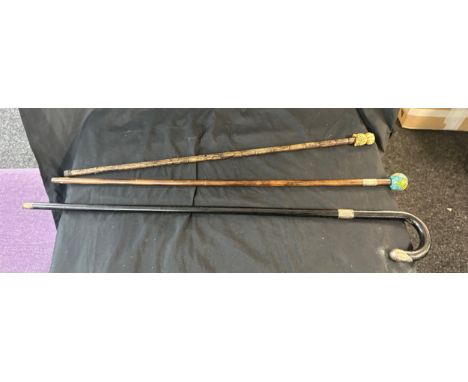 Selection of 3 vintage walking sticks includes silver rimmed, carved topped etc