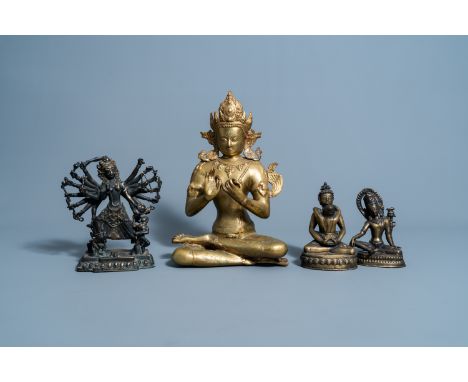 Full title: Four various Sino-Tibetan brass and bronze figures, 20th C.Description:H 40,7 - 16,7 cm (the tallest and the smal