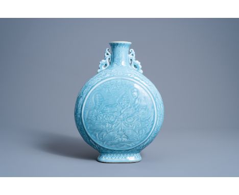 Full title: A Chinese monochrome lavender blue 'dragon and carps' moon flask, Qianlong mark, 20th C.Description:H 36,8 cm  Th