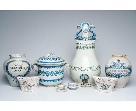 Full title: A varied collection of blue and white and polychrome French faience, 19th C.Description:H 57,6 cm (water basin)  