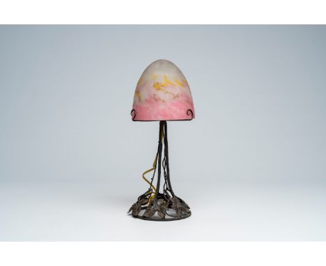 Full title: A French wrought iron 'mushroom' table lamp with a glass paste shade, Muller FrÃ¨res, Luneville, second quarter 2