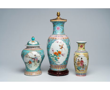 Full title: Three various Chinese famille rose vases, one of which mounted as a lamp, 20th C.Description:H 55,4 cm (the vase 