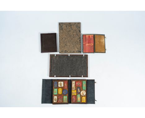 Full title: Two Chinese boxes with inkstones, a tea block, a printing plate and a type case, 20th C.Description:48,6 x 29 cm 