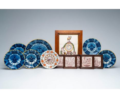Full title: A varied collection of Dutch Delft blue, white and polychrome plates and chargers, manganese tiles and a polychro